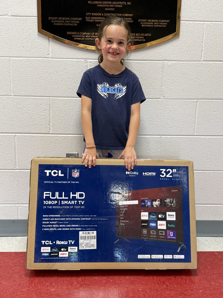 A prize winner with her tv! 