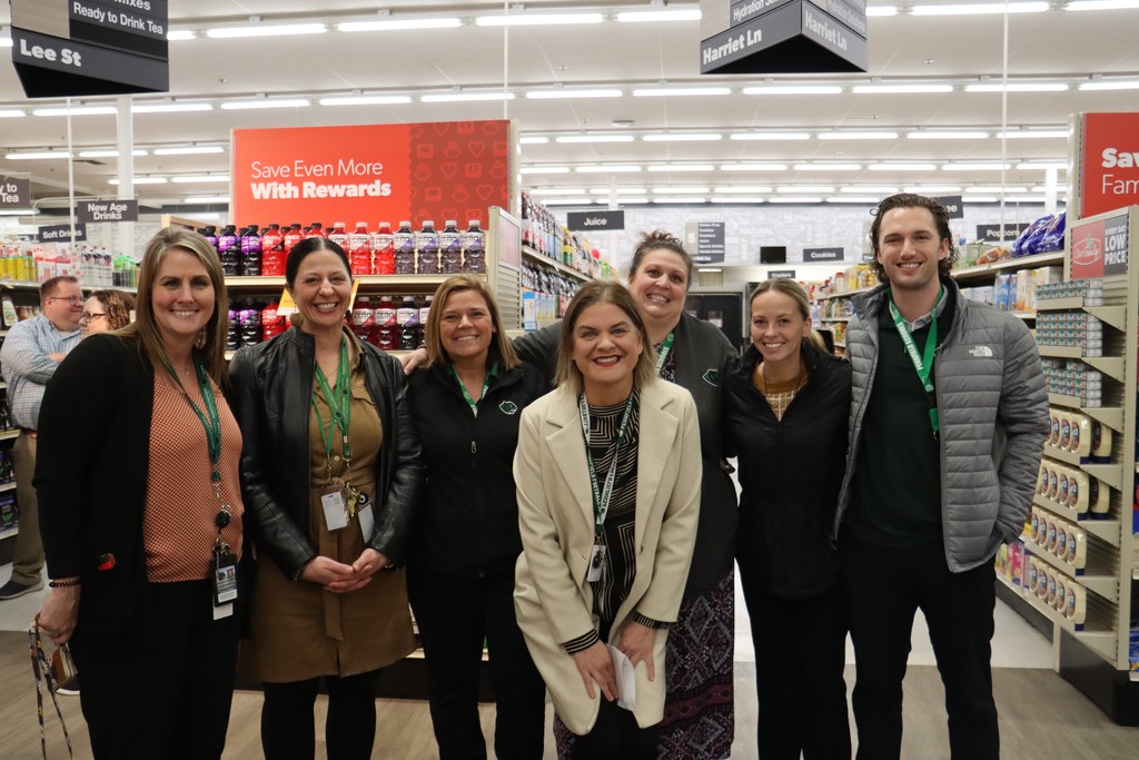 Pennfield Staff smiling for photo in Family Fare Grocery store