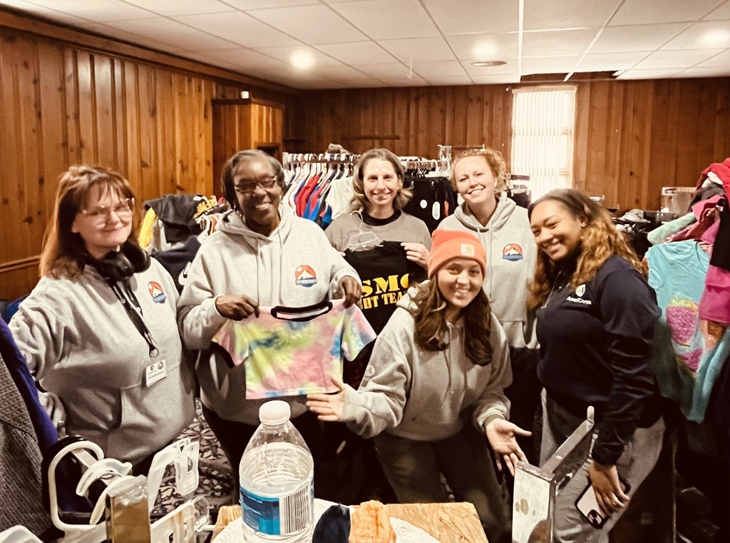 Members serving at clothing closet