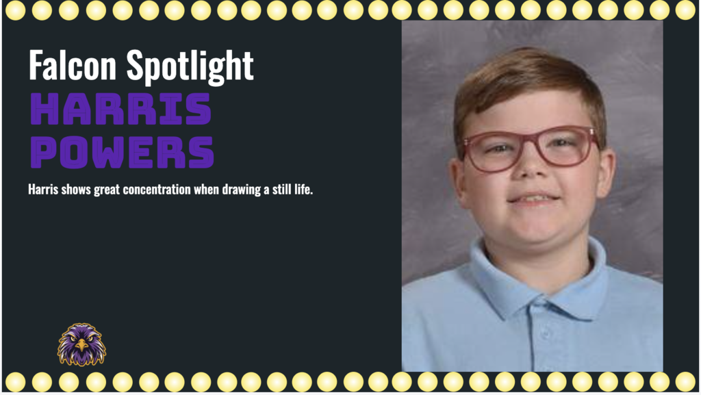 Harris shows great concentration when drawing a still life.