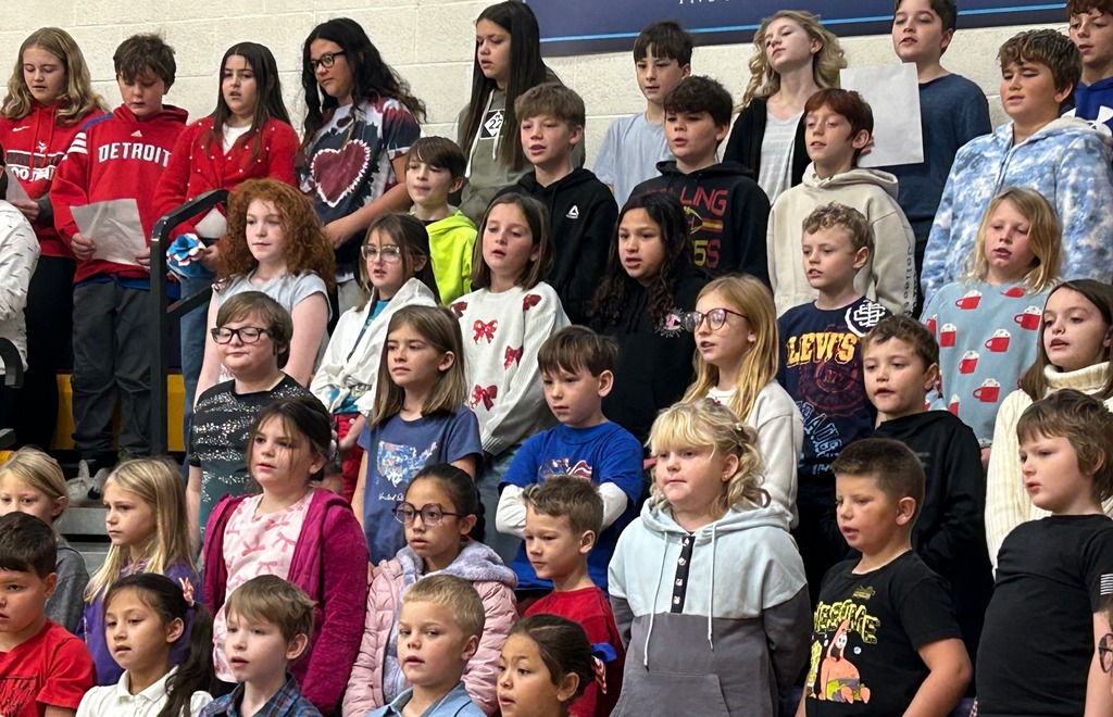 Elementary students singing "Grand Old Flag!"