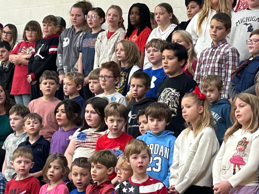 Elementary students singing "Grand Old Flag!"