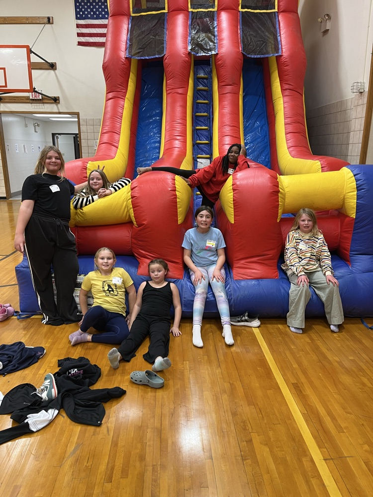 Students on the bounce house