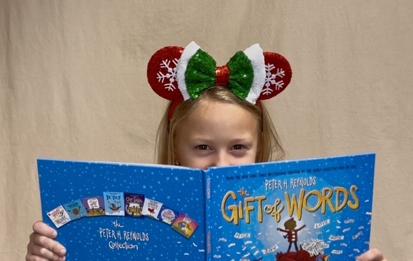 Pentwater elementary students share the Gift of Reading video.