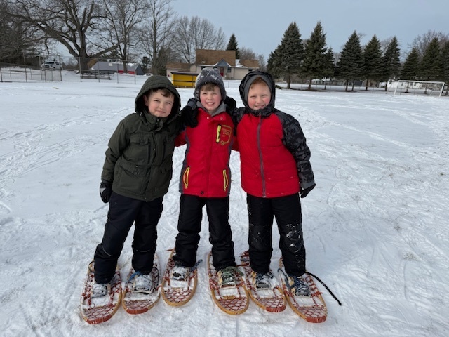 Boys snowshoeing