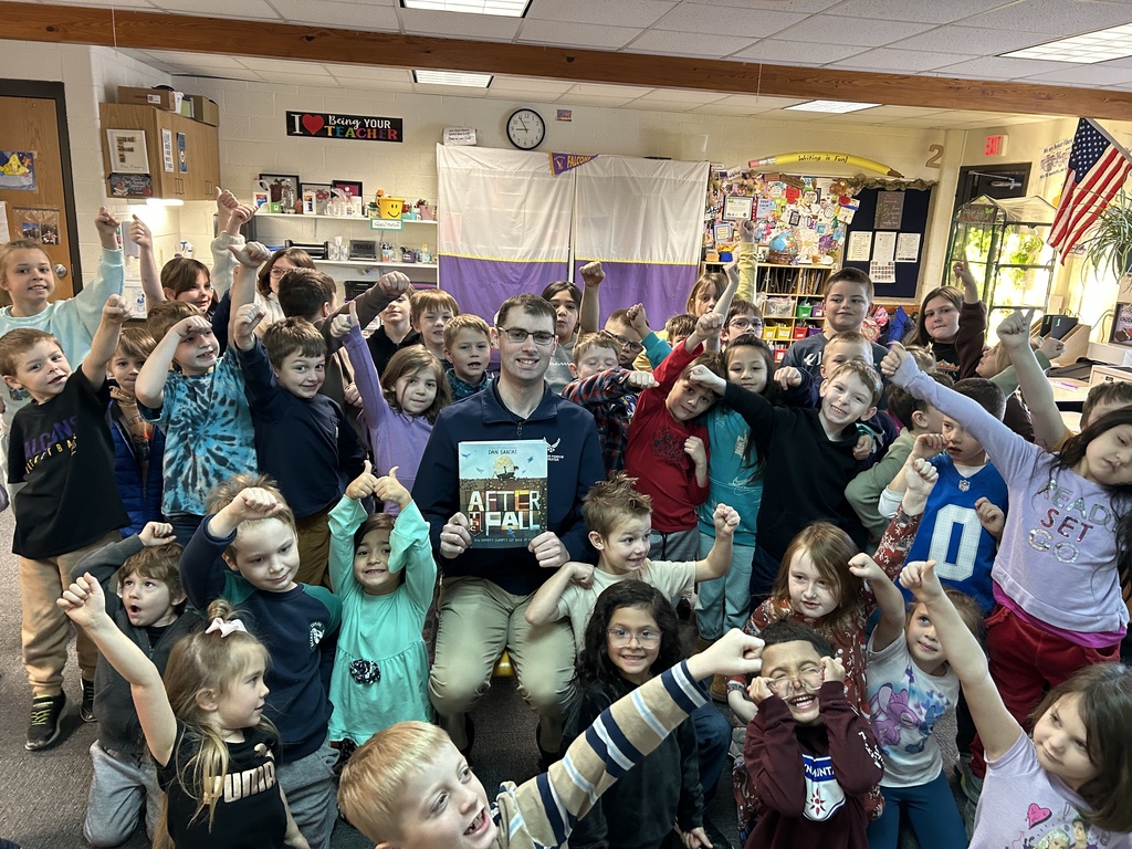 Pentwater Elementary students enjoy listening to a United States Air Force Senior Airman for March is Reading Month.
