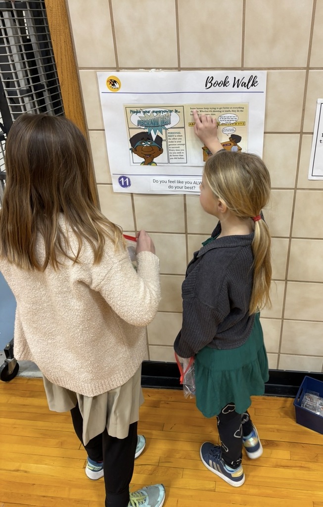 Pentwater elementary students enjoyed an indoor bookwalk with their reading buddies from other grade levels.