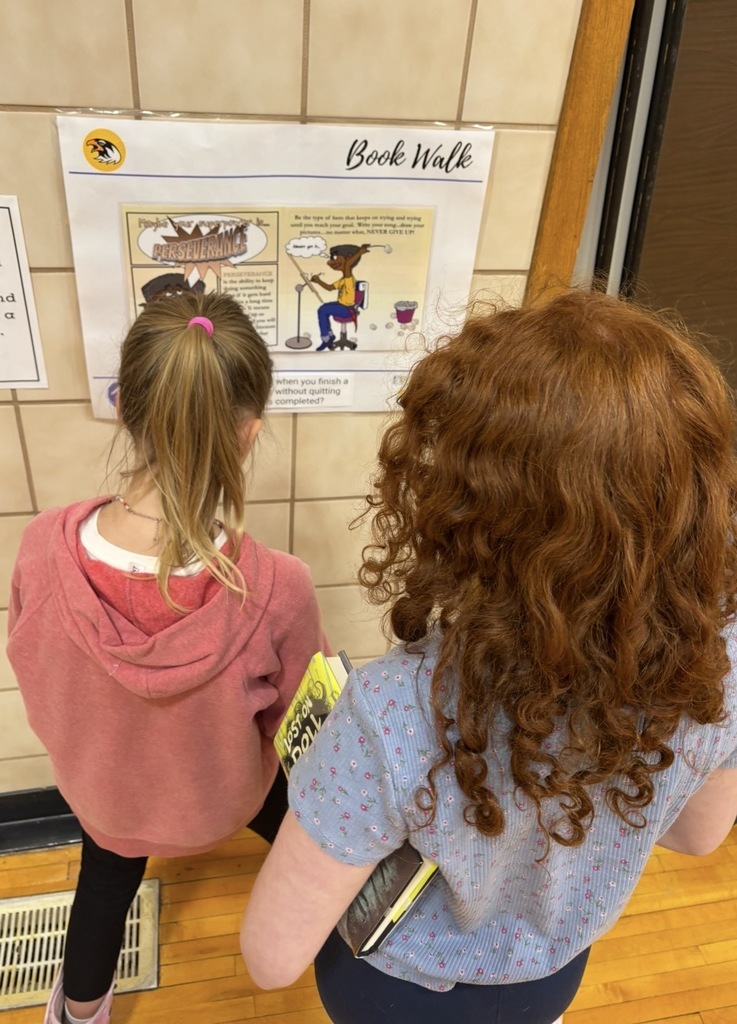 Pentwater elementary students enjoyed an indoor bookwalk with their reading buddies from other grade levels.