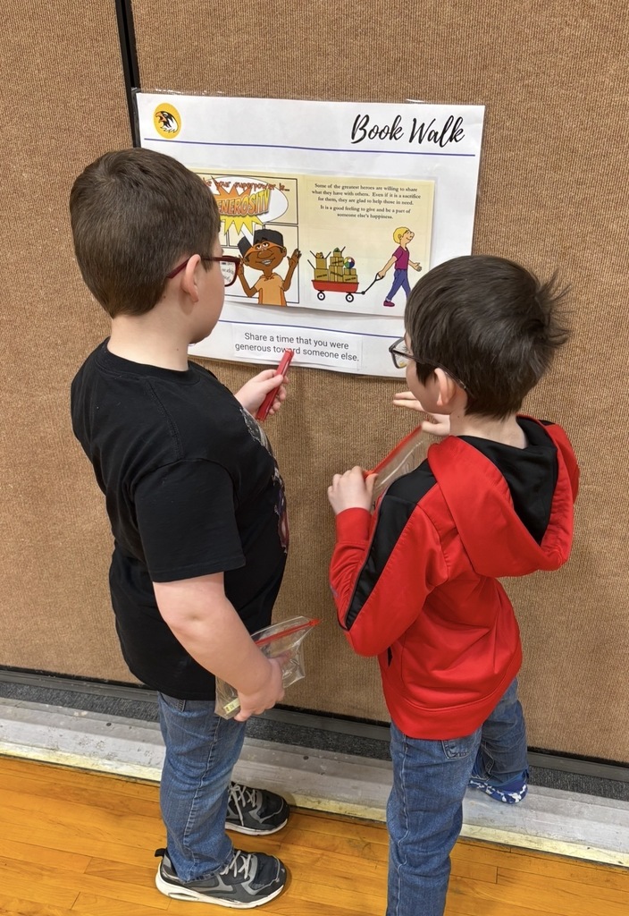 Pentwater elementary students enjoyed an indoor bookwalk with their reading buddies from other grade levels.