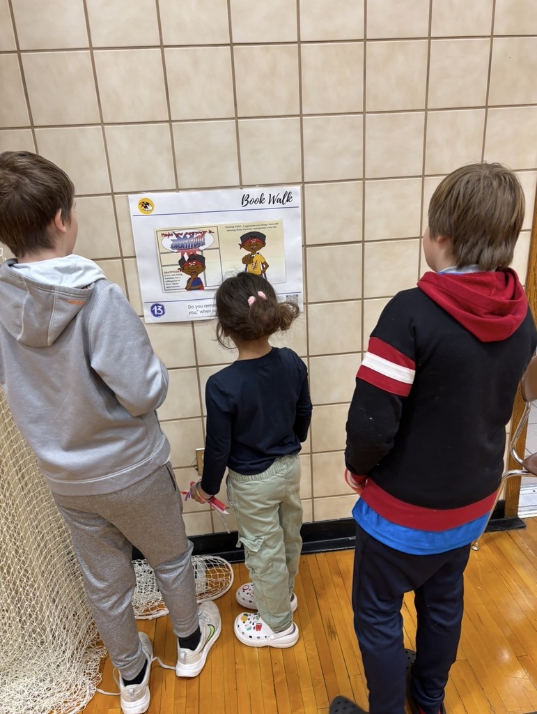 Pentwater elementary students enjoyed an indoor bookwalk with their reading buddies from other grade levels.
