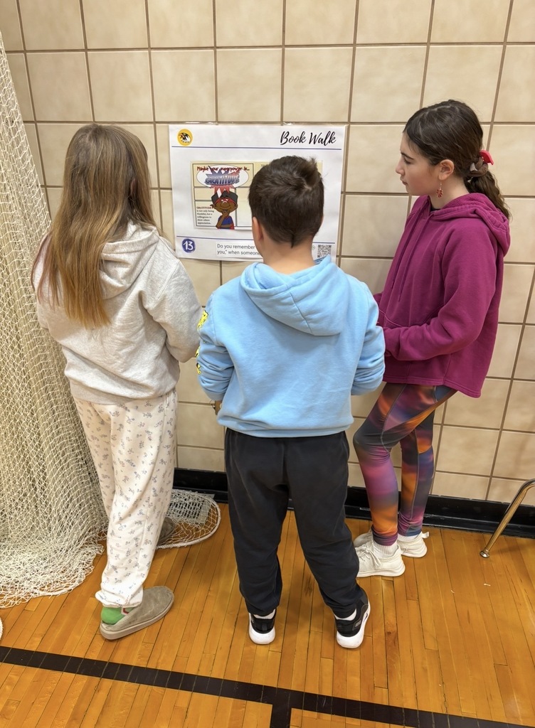 Pentwater elementary students enjoyed an indoor bookwalk with their reading buddies from other grade levels.