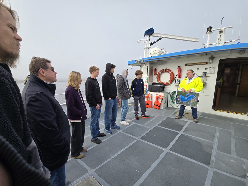 students on board boat