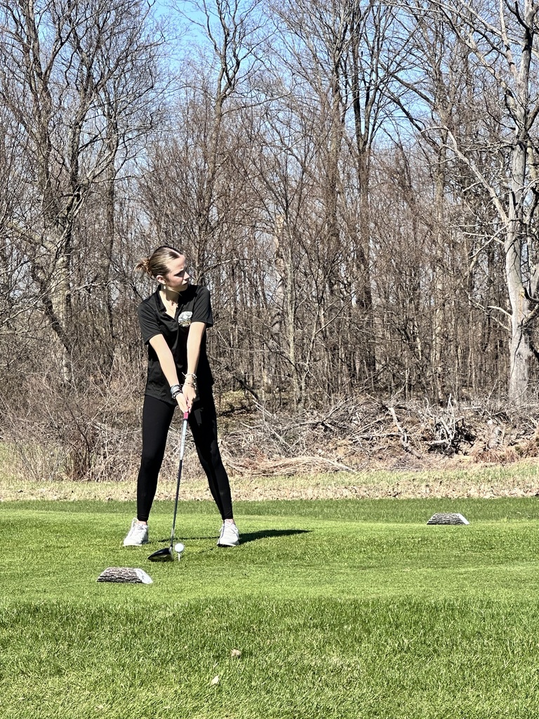 Izzy Kolenda getting ready to swing her golf club