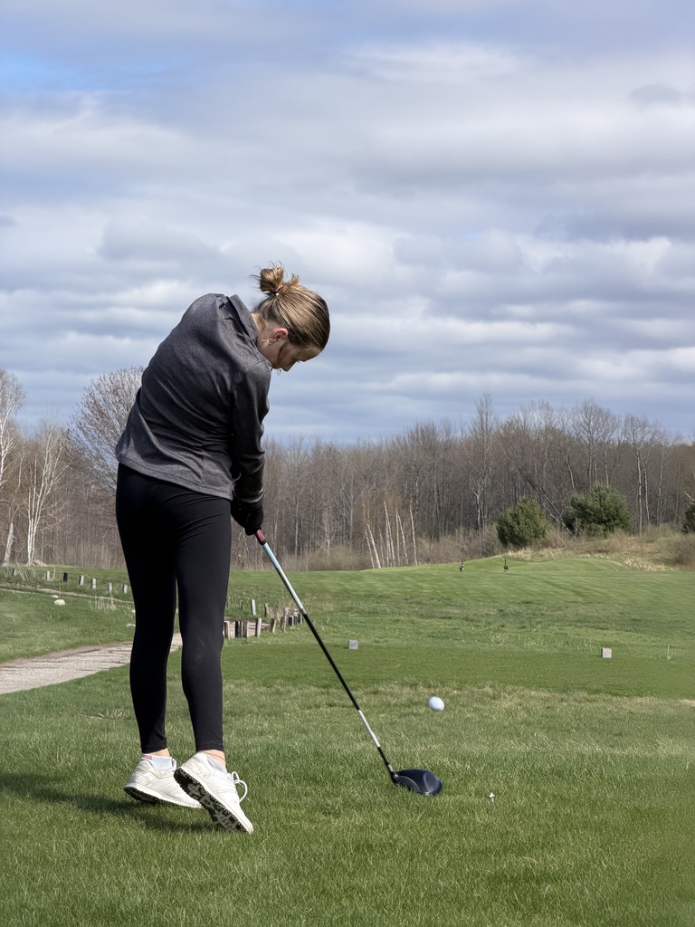 Izzy Kolenda playing golf