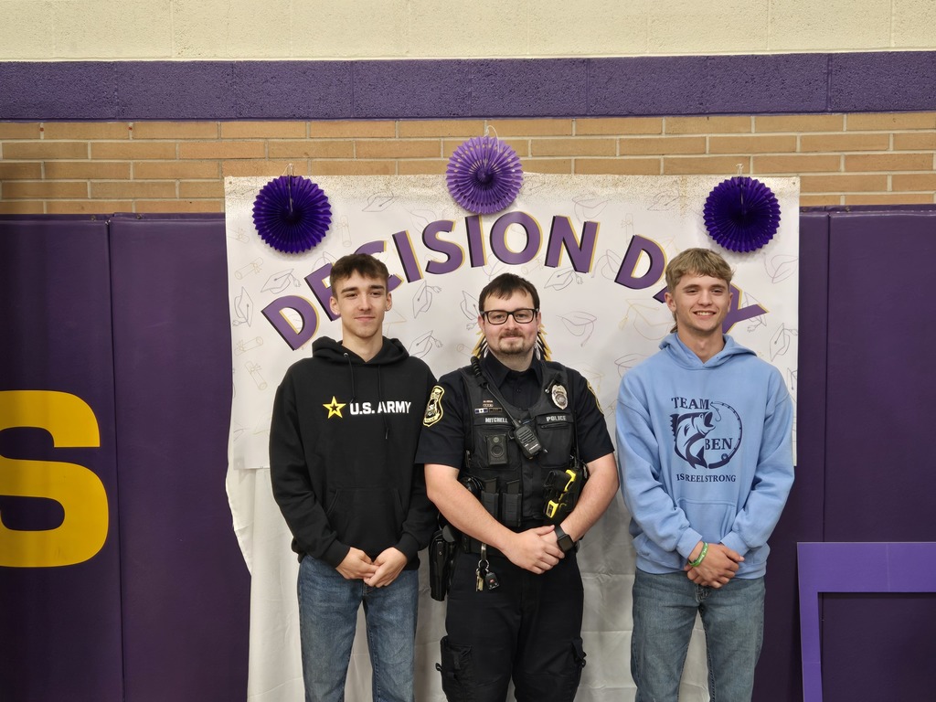 2 boys with officer darwin