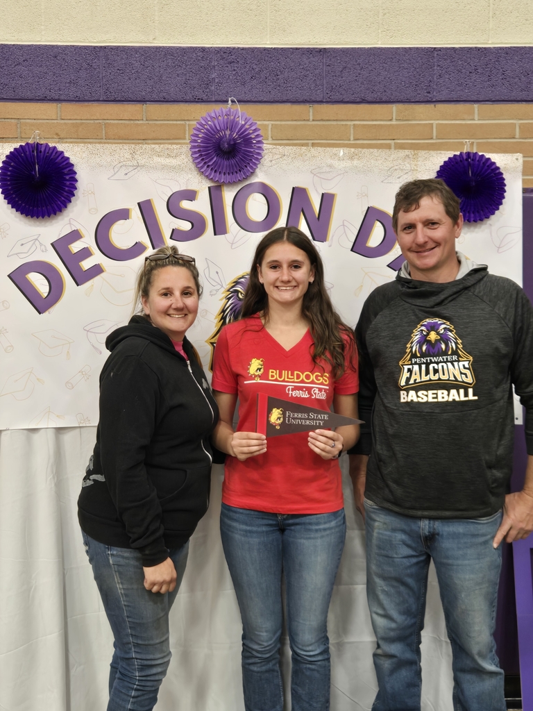 Girls and her parents hold ferris flag