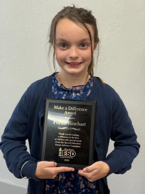 Porter with her award - Make A Difference