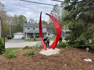 Students spreading mulch at the artisan center
