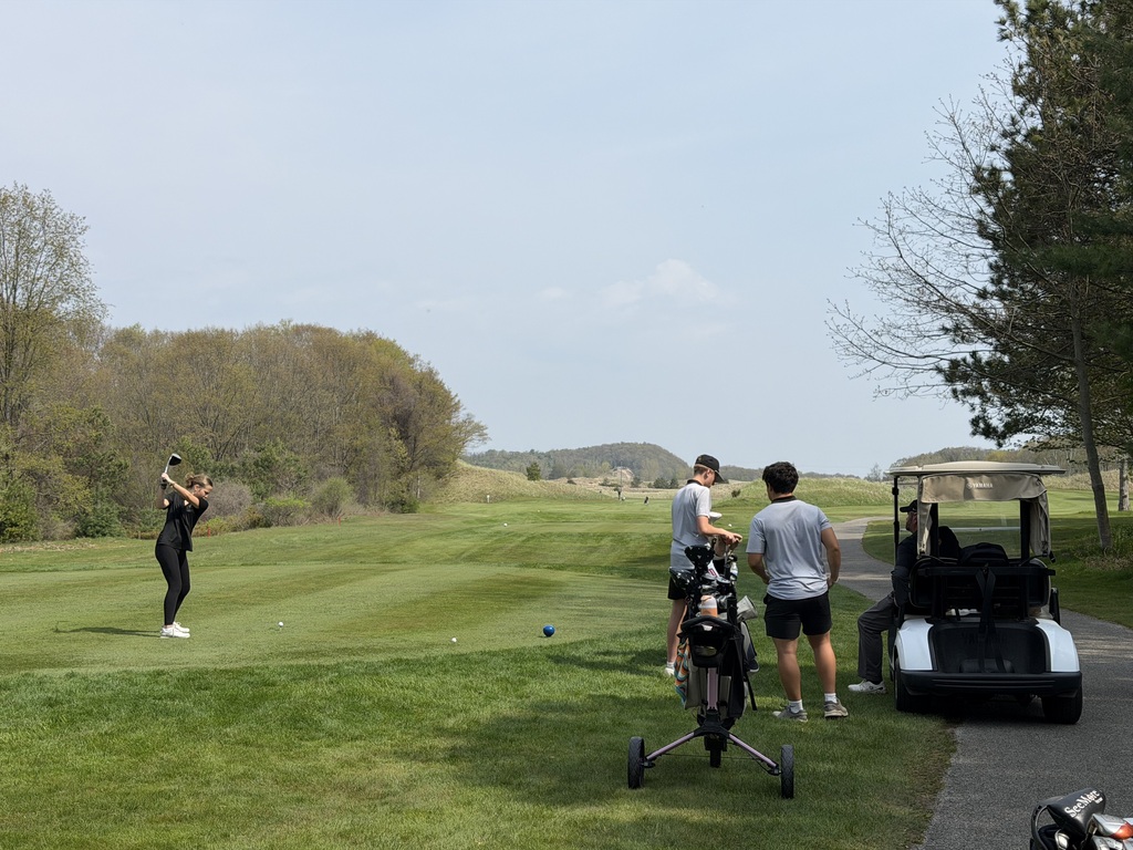 Izzy Kolenda t'ing off at Ludington Lakeside Links