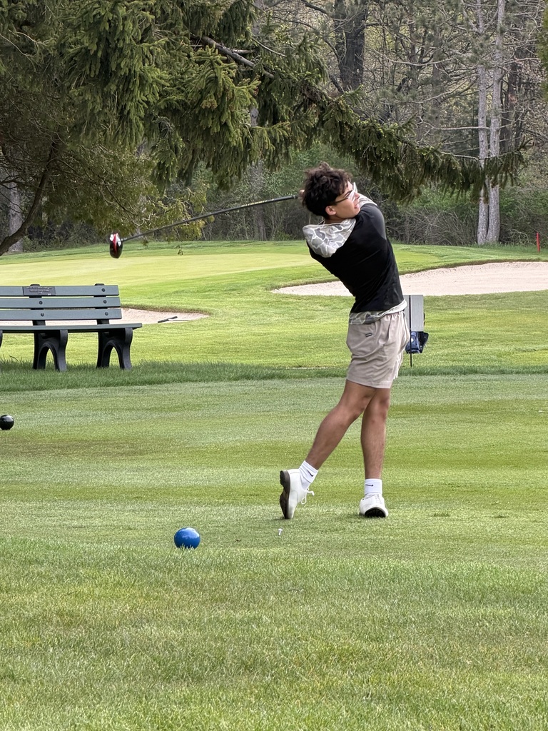 Edgar Vazquez hitting the golf ball at Ludington Lakeside Links Golf Club