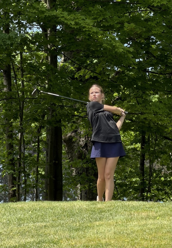Izzy Kolenda swinging hard at golf regionals on Tuesday, 5/26, at Crystal Mountain