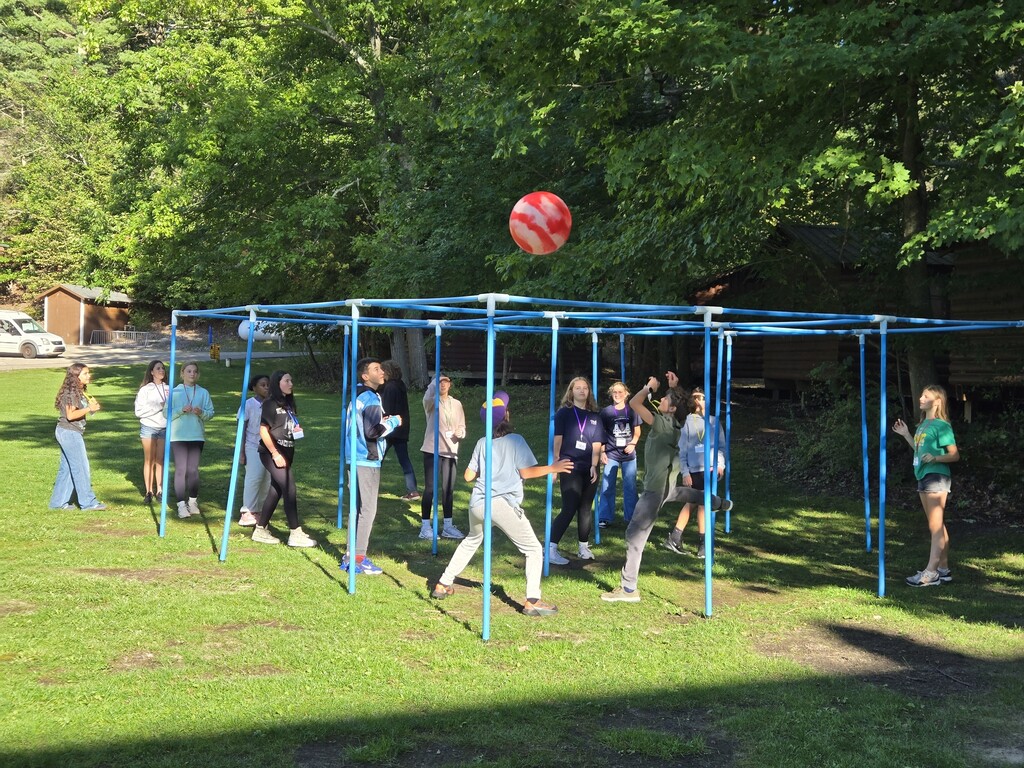 Middle Schoolers from multiple schools playing 9 square.