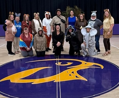 Elementary Staff Photo for Halloween - Welcome to the Jungle!