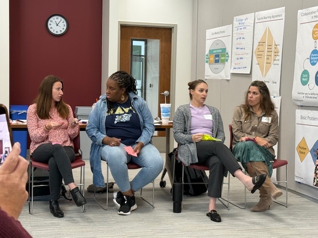 EF Participants talking in small groups