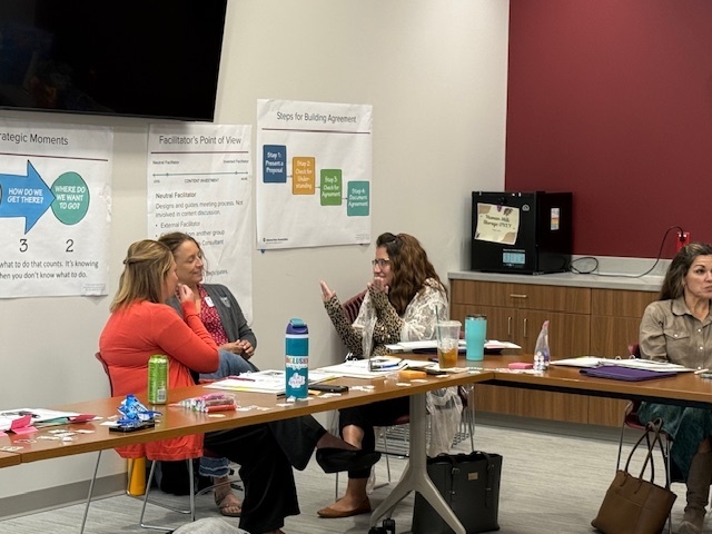 EF Participants talking in small groups