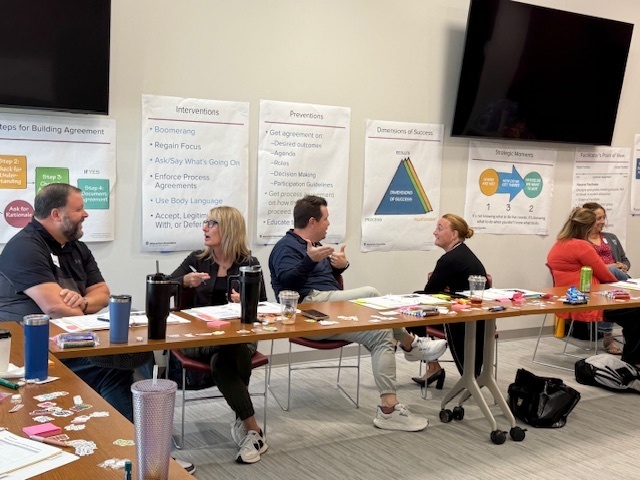 EF Participants talking in small groups