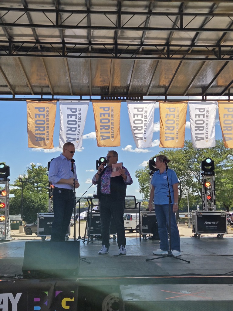 Regional Superintendent George McKenna and Assistant Regional Superintendent Amy Smith discussing the importance of the arts at Go Day 2025!