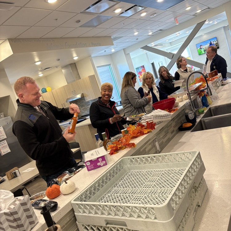 Members of ROE team serving lunch