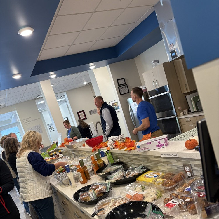 Members of ROE team serving lunch