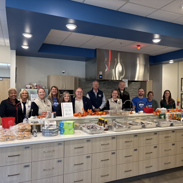 Members of ROE team serving lunch