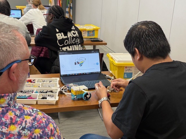 Participants working with their LEGO Stem Kits