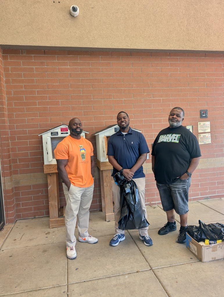 ROE team members cleaning PPS Little Food Pantries