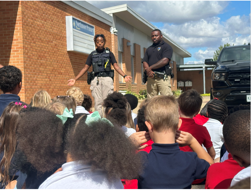 Officer Birris and Officer Fuller with K Students