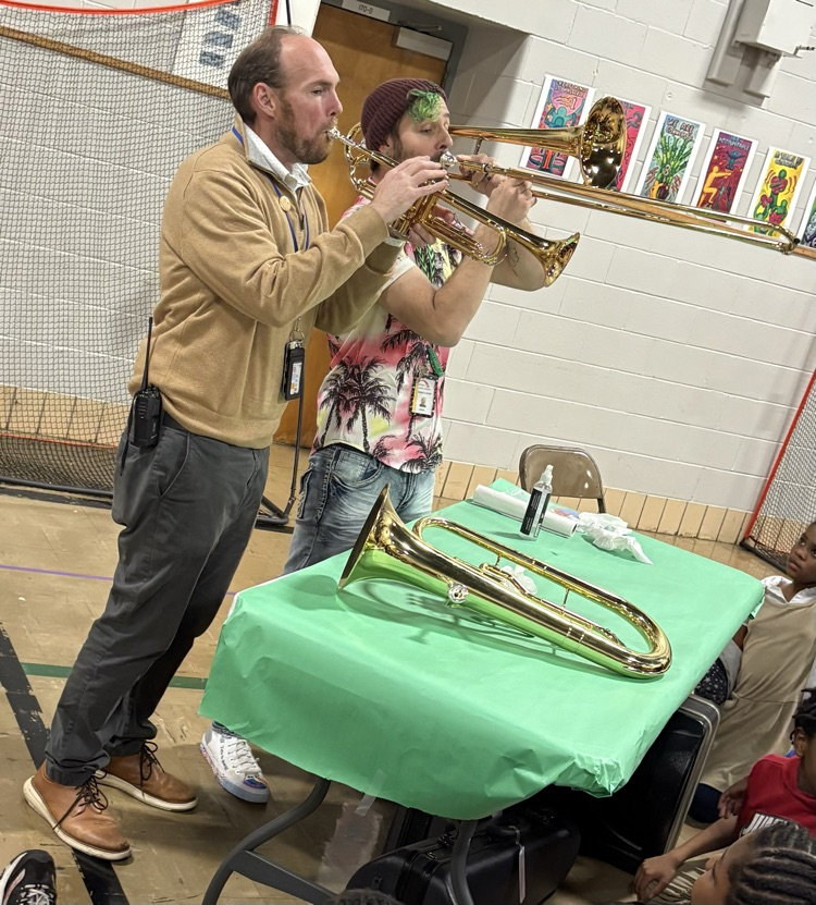 Mr. Lohrer was our resident brass player and demonstrated his trombone skills while Mr. Durr tried his hand on the trumpet for the kids.