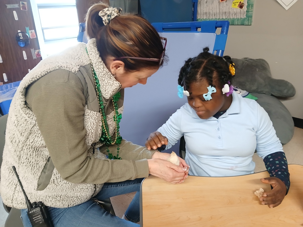 Teacher and student with baby chick