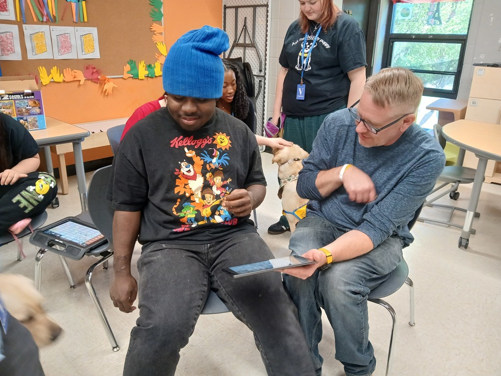 student using AAC device