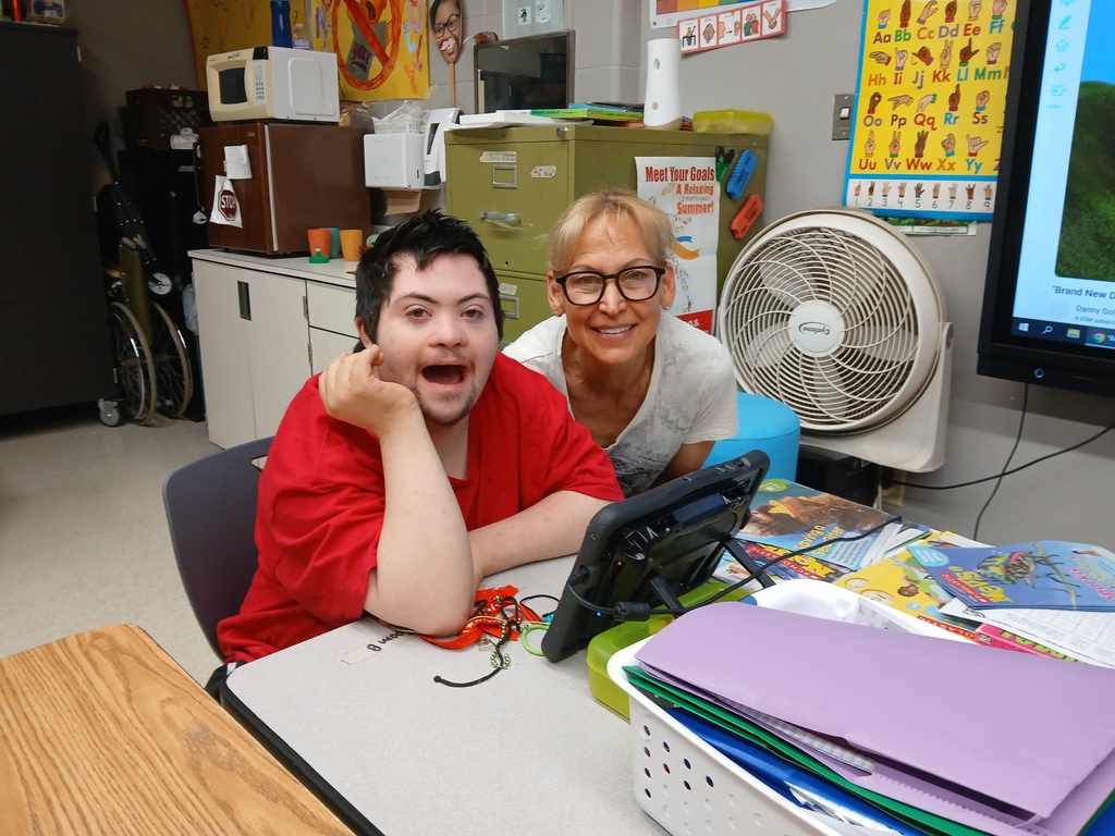 Aide with student