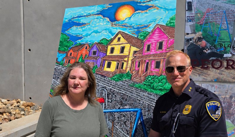 police chief with mural