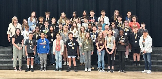 Students Receiving Academic Medals at ZH