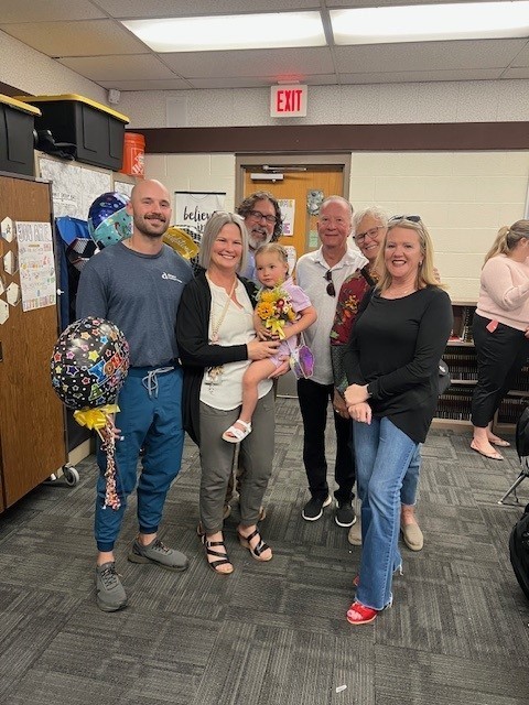 Mrs. Villanueva with her family