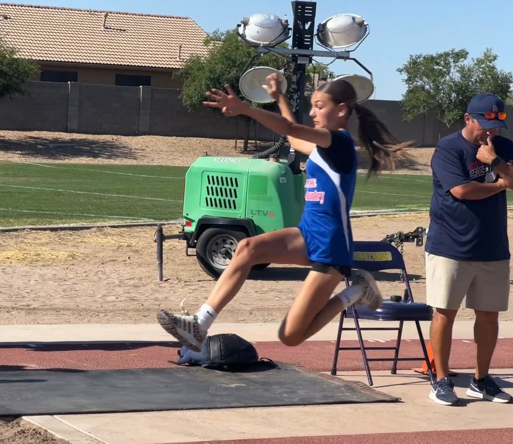 Ava preforms long jump