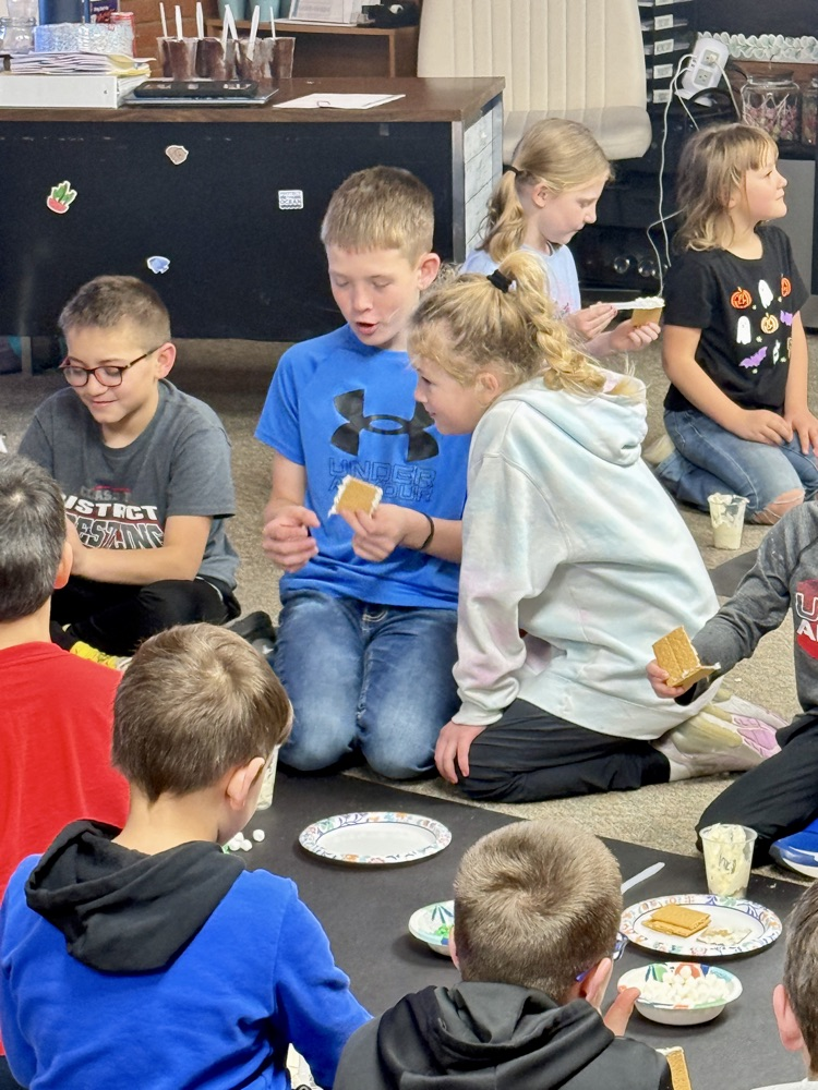 Sixth and First graders partnered with one another to build gingerbread houses. #plainsmenpride