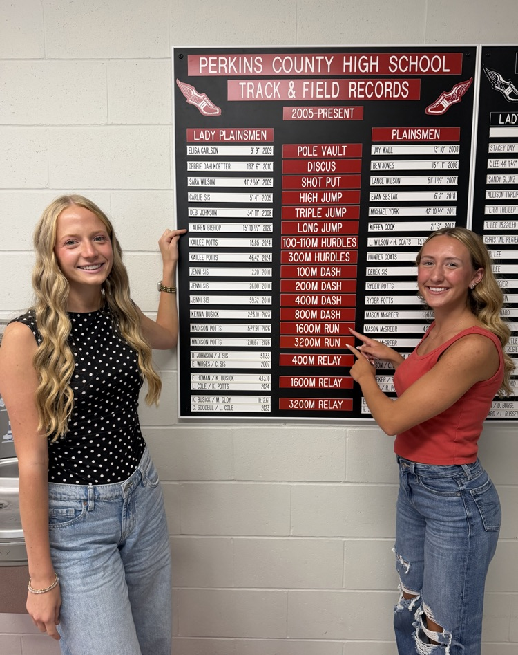 Psst…Coach Hite just updated the T&F Record Board!  Lauren Bishop and Madison Potts were excited to spot their names alongside their record-setting performances from Spring 2026. #plainsmenpride