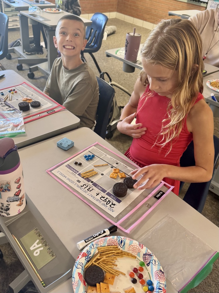 5th graders cooked up some math skills today by using various snacks as manipulatives to model adding decimals. 🥨Ⓜ️🍪