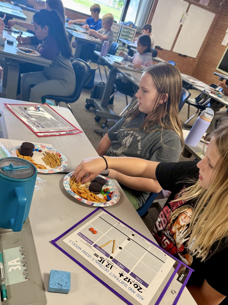 5th graders cooked up some math skills today by using various snacks as manipulatives to model adding decimals. 🥨Ⓜ️🍪