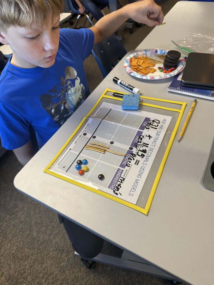 5th graders cooked up some math skills today by using various snacks as manipulatives to model adding decimals. 🥨Ⓜ️🍪
